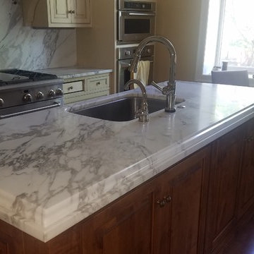 Calacatta Gold marble kitchen by The Beveled Edge