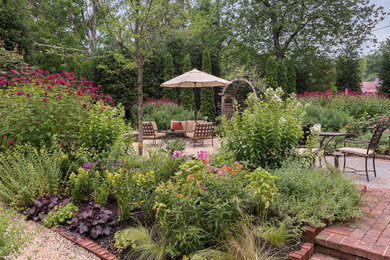 Photo of a large contemporary backyard gravel formal garden in DC Metro.
