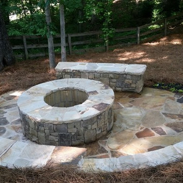 Backyard firepit and stone pathway
