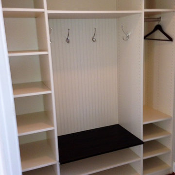Antique White Mudroom built inside reach-in coat closet