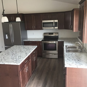 Maple Pecan Cabinets w/ Formica Tops