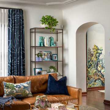 Scenic landscape wallpaper mural in classic dining room as seen through eclectic