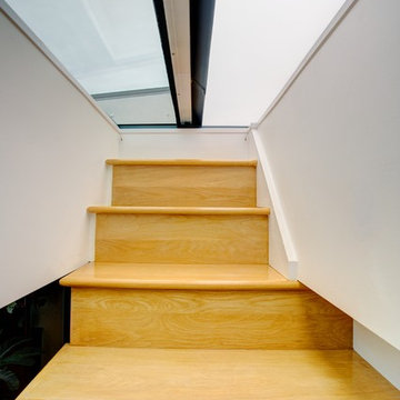 A mansard conversion: master bedroom, a large en suite and a roof terrace