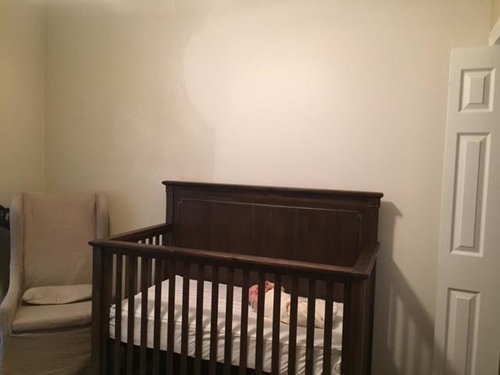 hanging art above crib