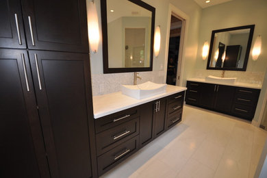 Bathroom - mid-sized contemporary master gray tile and porcelain tile porcelain tile bathroom idea in Miami with gray walls, a vessel sink, shaker cabinets, dark wood cabinets, quartz countertops and a two-piece toilet