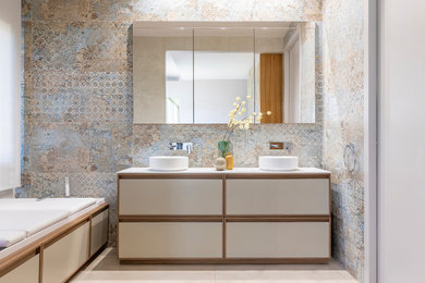 Design ideas for a large contemporary master bathroom in Other with dark wood cabinets, a hot tub, a curbless shower, ceramic floors, a vessel sink, an enclosed toilet, a double vanity, a built-in vanity and flat-panel cabinets.