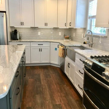 White Kitchen with Grey Marble countertops