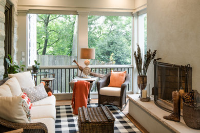 Eclectic screened-in back porch photo in Nashville