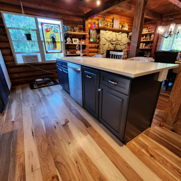 Eclectic Log Cabin Kitchen with French Influence