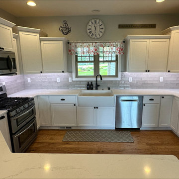 Fresh & Bright: Cabinet Refacing in Satin White with Quartz Upgrade