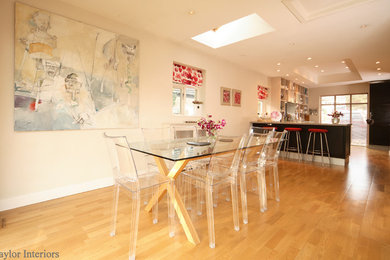 This is an example of a contemporary dining room in Buckinghamshire.