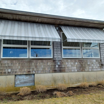 Retractable Window Awnings for a home on Cape Cod
