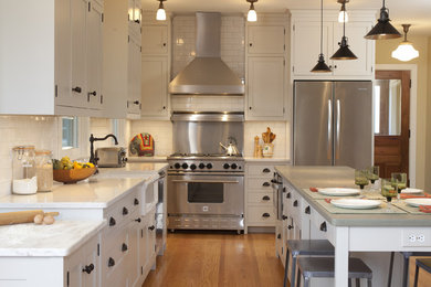 Inspiration for a traditional kitchen in New York with a farmhouse sink and stainless steel appliances.