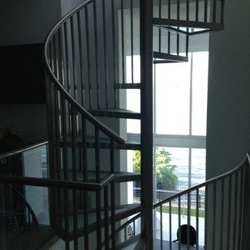 Stainless steel and obscure glass spiral staircase