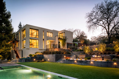 Trendy beige three-story exterior home photo in San Francisco