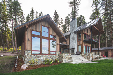 Mountain style home design photo in Other