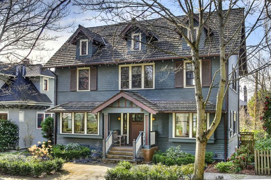 Example of a transitional exterior home design in Seattle