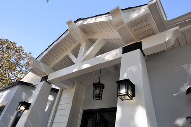 Example of a transitional single front door design in Los Angeles with a blue front door