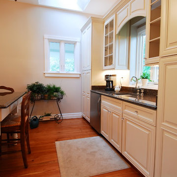 White Maple Traditional Kitchen with Black Granite in Germantown, MD