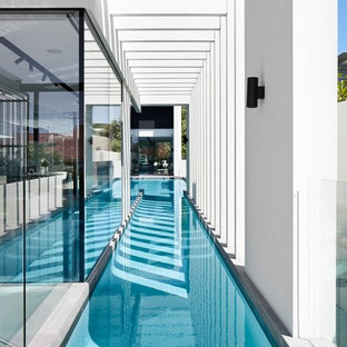 パースの大きいL型コンテンポラリースタイルのおしゃれなプールの写真