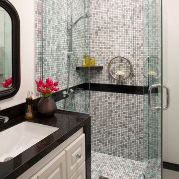 Traditional black and white bathroom with mosaic shower