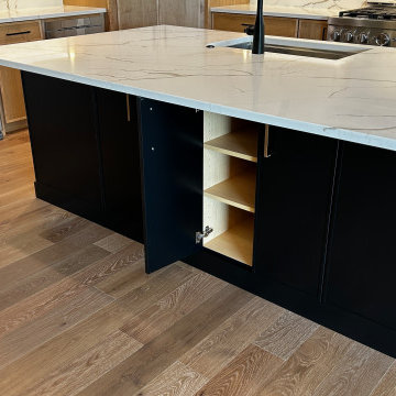 Maple Pecan Stain and Painted Black Kitchen Design in Bettendorf, Iowa