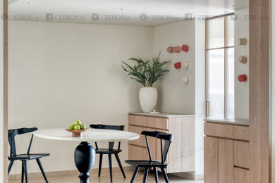 Dining room - contemporary dining room idea in Mumbai