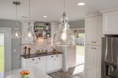 Kitchen - country kitchen idea in Other