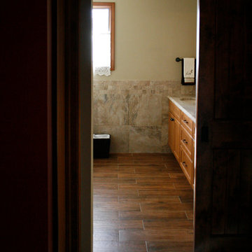 Spacious Master Bath with Sliding Barn Door in Troy