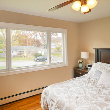 Pretty Master Bedroom with Large New Windows - Renewal by Andersen NY
