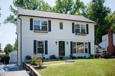 Mid-sized transitional white two-story concrete fiberboard exterior home photo in St Louis with a shingle roof