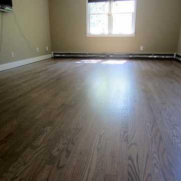 NISSEQUOGUE:  2 1/4" RED OAK W/ CUSTOM GREY BLEND STAIN + BONA TRAFFIC HD SATIN
