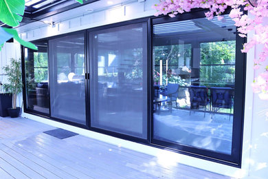 24-Foot Panoramic Sliding Glass Door for Luxury Kitchen Renovation | Englewood