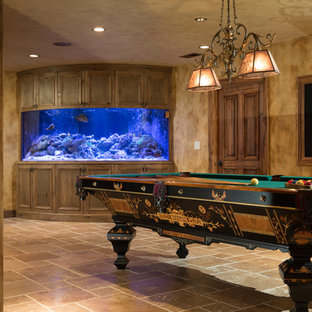 Large traditional basement in Chicago with travertine flooring.