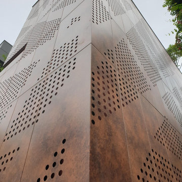 Perforated Panels in Commercial Facades: Functional Art in Architecture