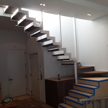 Custom walnut stairs & wet bar Soho- New York, NY