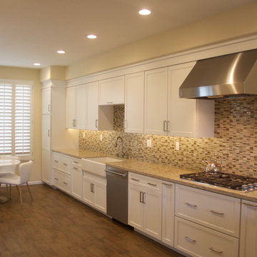 Relocated Kitchen Peninsula Sink Creates Expansive Open Kitchen