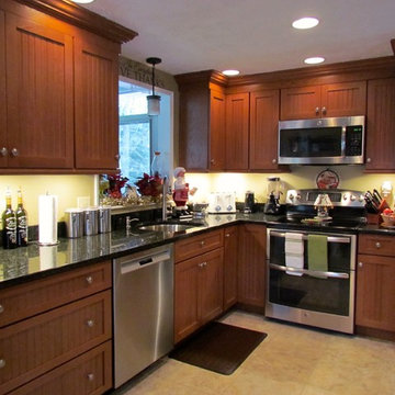 Transitional Peru Kitchen Remodel with Uba Tuba countertop.