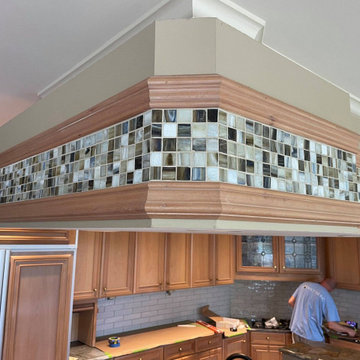 Recycled glass mosaic tile brought this kitchen island bulkhead to life!
