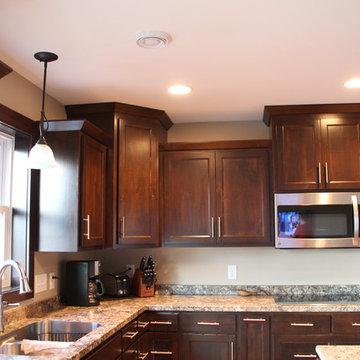 Staggered Kitchen Cabinets with Hidden Pantry