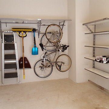 One car garage #shelving organized with Monkey Bars Storage.