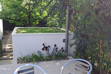 Idée de décoration pour une terrasse design.