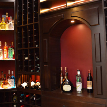 Arch Shelves and Glass Wine Cellar Doors