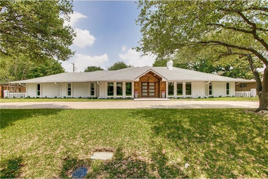 Large transitional exterior home photo in Dallas
