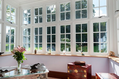 Inspiration for a traditional sunroom in Surrey.