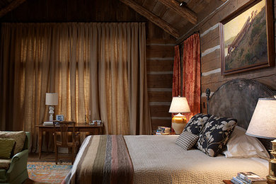 Example of a mountain style bedroom design in Other