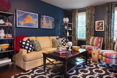 Family room - large traditional enclosed dark wood floor and brown floor family room idea in Boston with blue walls, no fireplace and no tv
