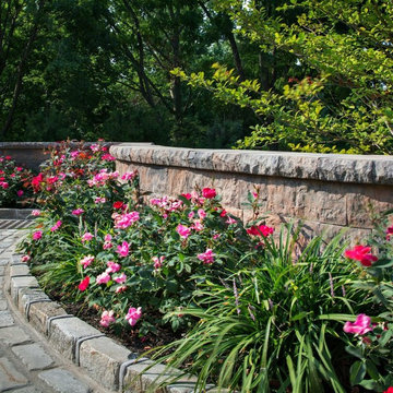 Perrenials Soften the retaining wall