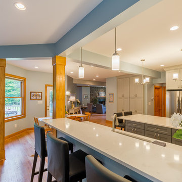 Pendant lighting over the countertop bar area.