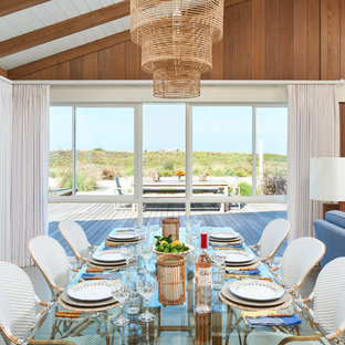 サンタバーバラの中サイズのミッドセンチュリースタイルのLDKの画像 (クッションフロア、茶色い壁、暖炉なし、グレーの床)